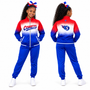 Springfield Comets warmup set with solid royal blue bottoms, front and back